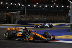 mclaren-f1’s-lando-norris-takes-second-on-podium-at-singapore-grand-prix-with-mcl60-race-cars-in-okx-stealth-mode-livery